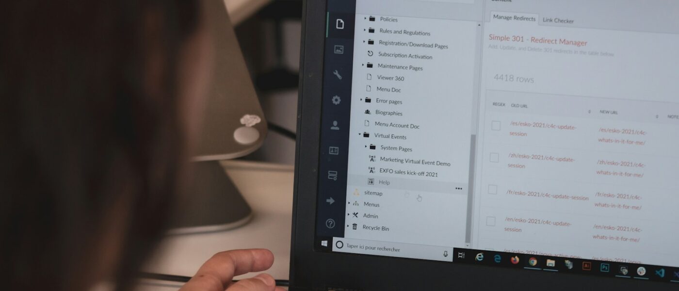 person using black laptop computer