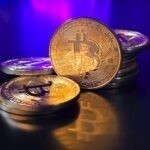 a pile of bitcoins sitting on top of a table