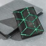 black and green box on black table