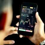 person holding black android smartphone