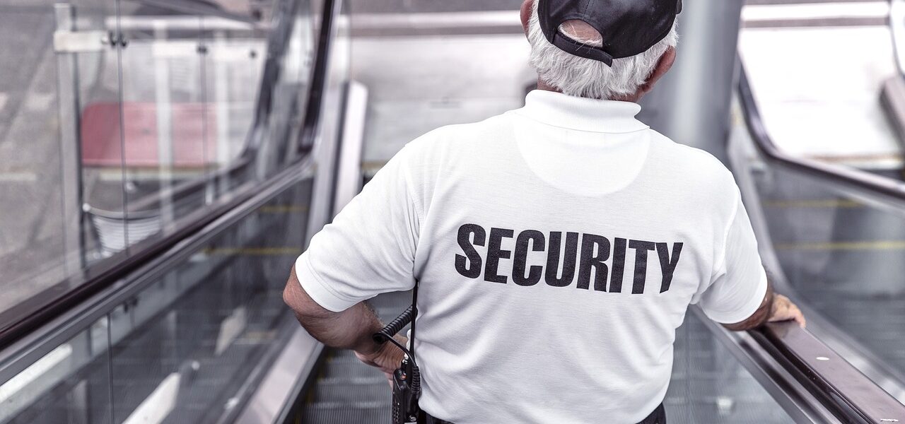 security, man, escalator, police, guard, officer, surveillance, control, monitoring, safety, uniform, back view, security, security, security, security, security, police, safety