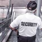 security, man, escalator, police, guard, officer, surveillance, control, monitoring, safety, uniform, back view, security, security, security, security, security, police, safety