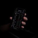 person holding black iphone 5