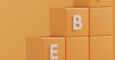 a 3d rendering of a pyramid of blocks with the letters e, b, e