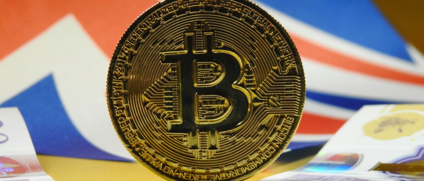 gold and black round coin