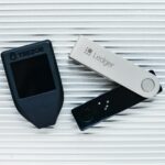 two electronic devices sitting next to each other