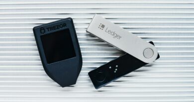 two electronic devices sitting next to each other