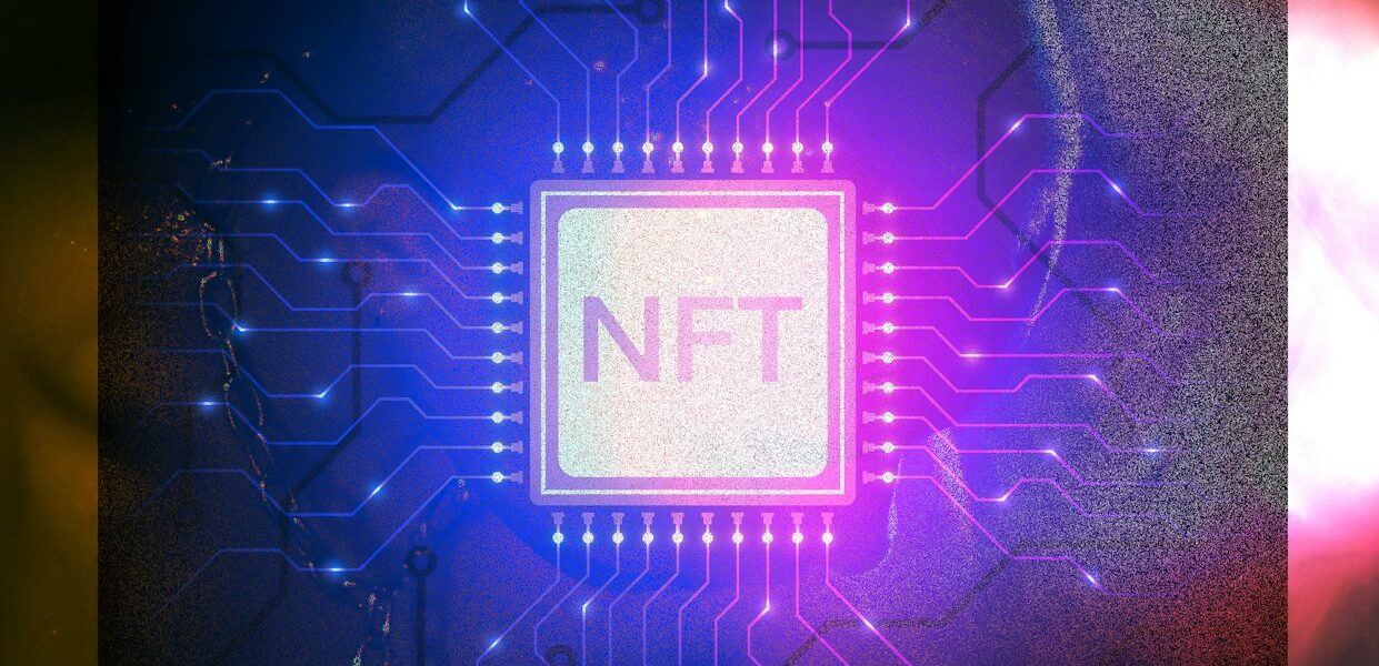 a close up of a circuit board with a neon light