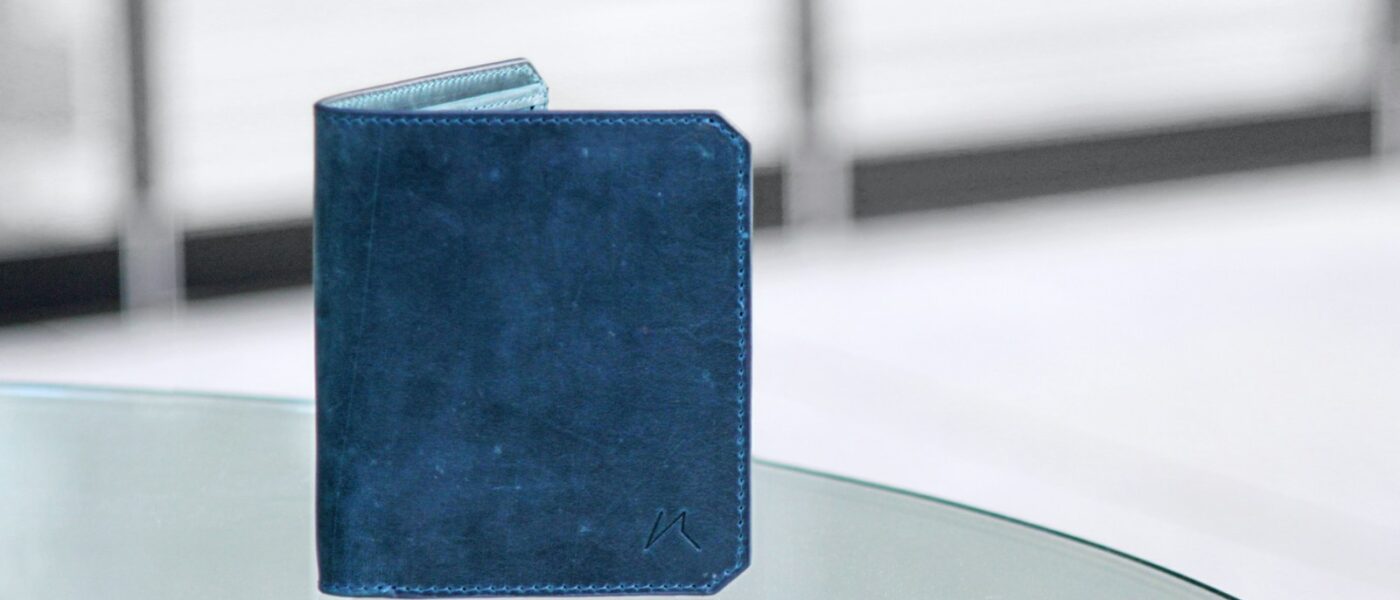 blue tablet computer on white table