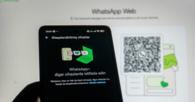 Phone scanning whatsapp web qr code on screen