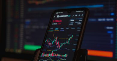 black android smartphone on brown wooden table