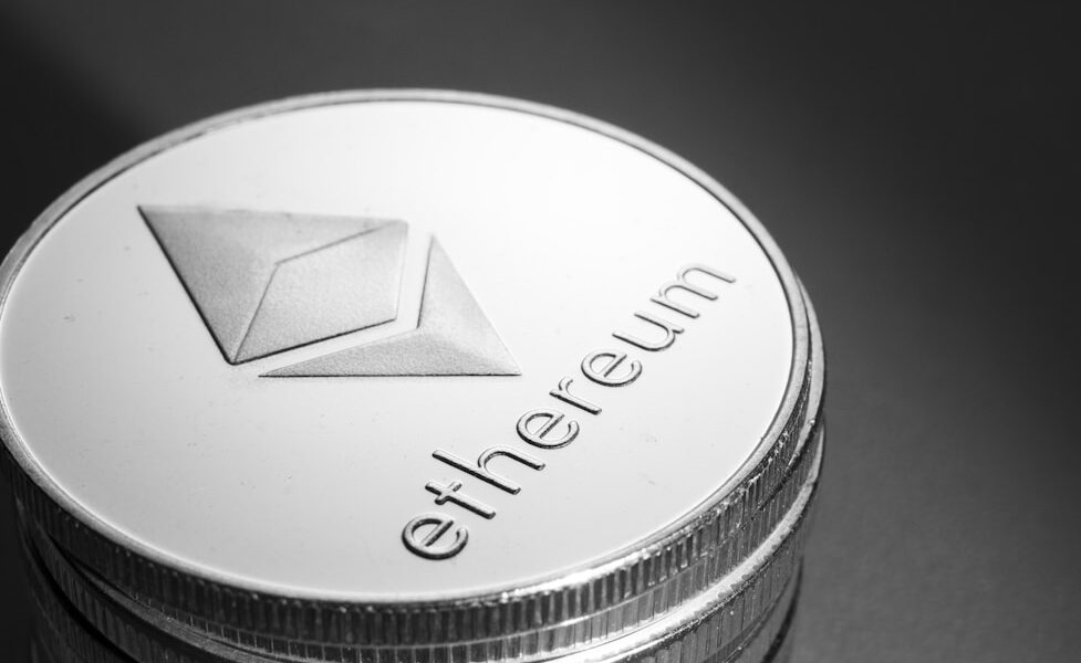 silver and black round container